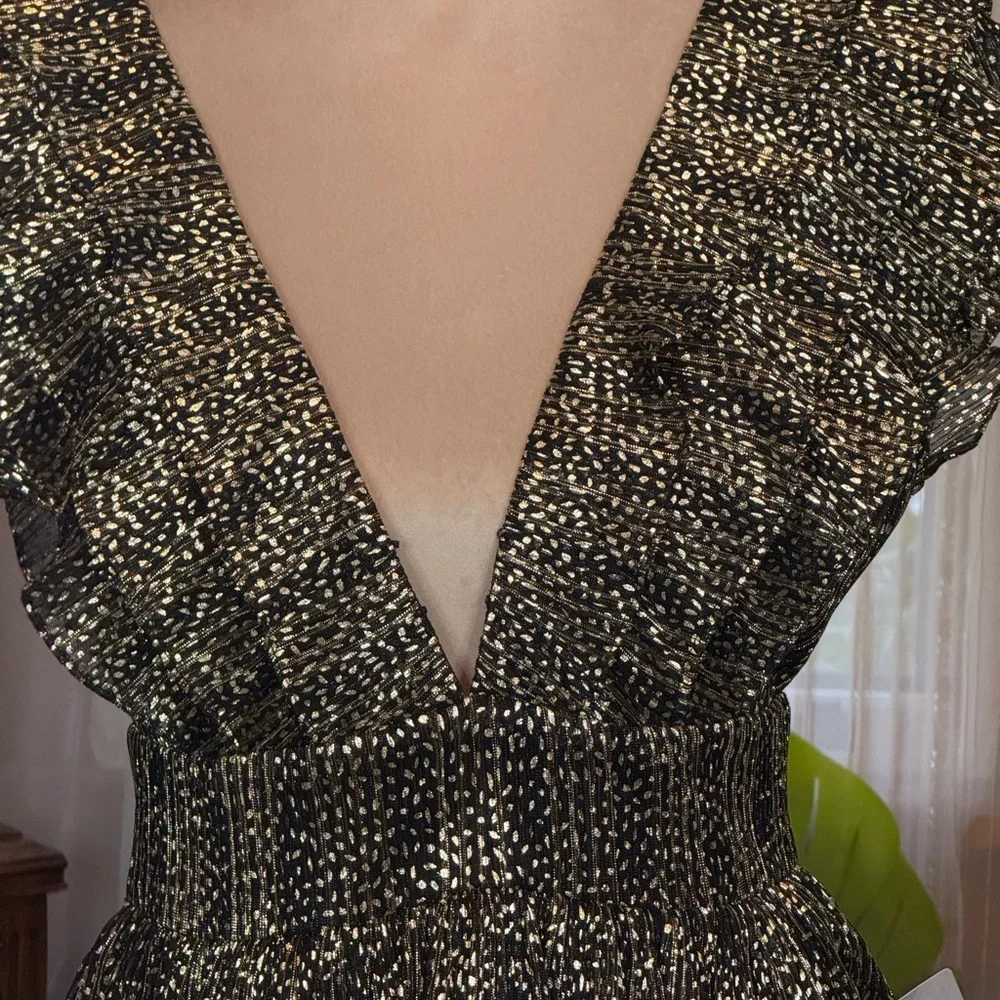 Socialite Mini Dot Ruffled Babydoll Dress in Black and Gold